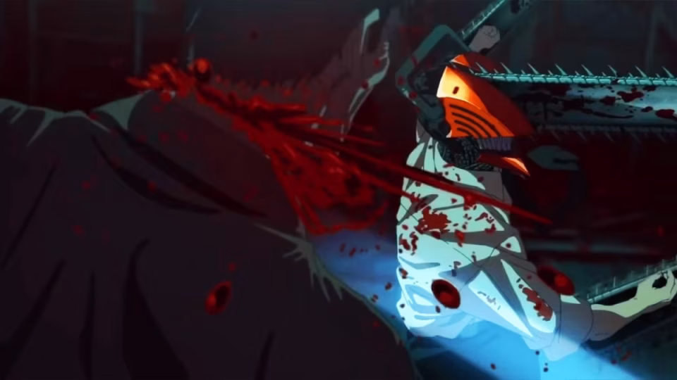 A violent key visual from the Chainsaw Man anime shows Denji in Chainsaw Man form, covered in blood, wielding his chainsaw arms against a dark background. - midnightrebels.com