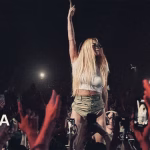 Kesha performs at a Boiler Room event in Miami, with fans holding up their phones to record the show. - midnightrebels.com