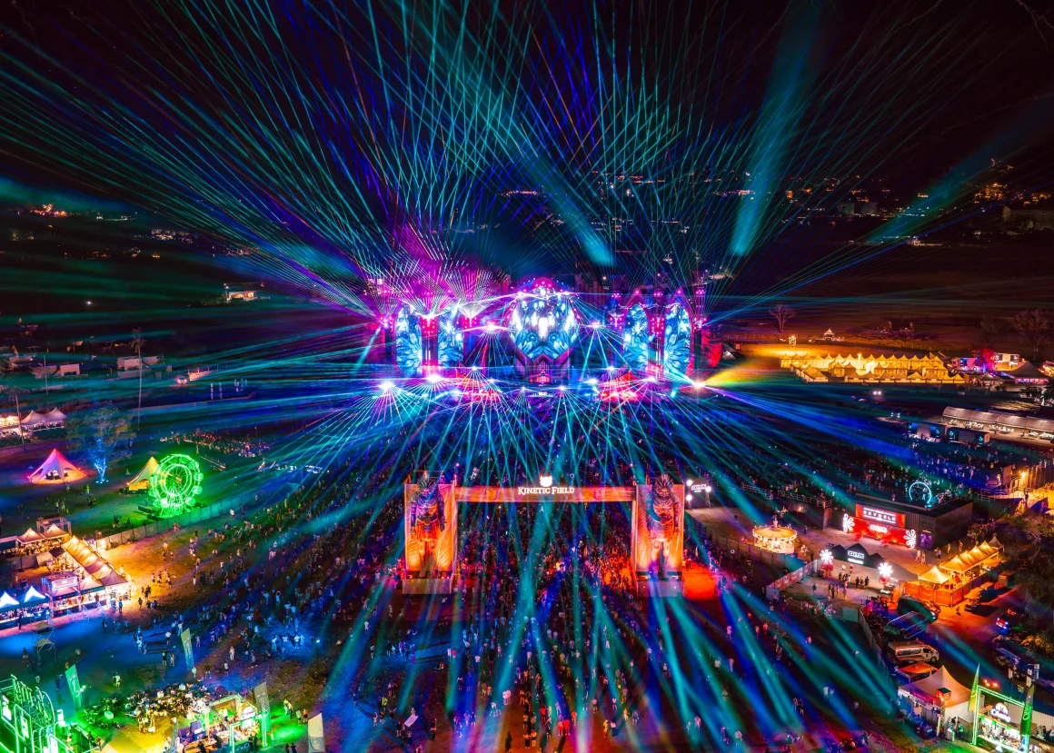 Kinetic Field EDC festival aerial view, lights, crowds, stage, entrance gate.