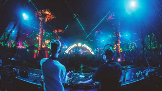 DJs perform at Bionic Jungle, vibrant jungle-themed music festival.