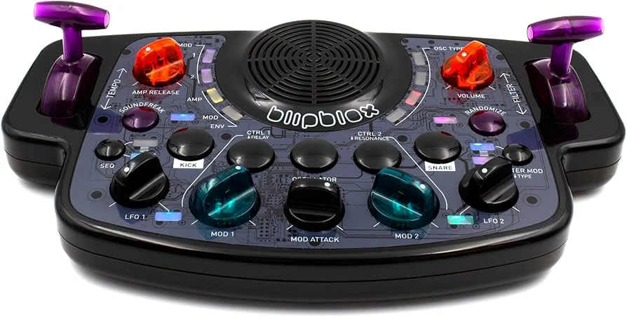 A colorful electronic music synthesizer with various knobs, sliders, and joystick controllers for sound manipulation.