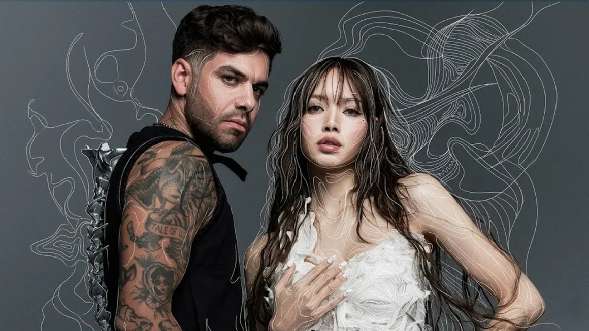 Man with tattoos on his arm and a woman in a white textured dress standing against a gray background with white abstract line art surrounding them