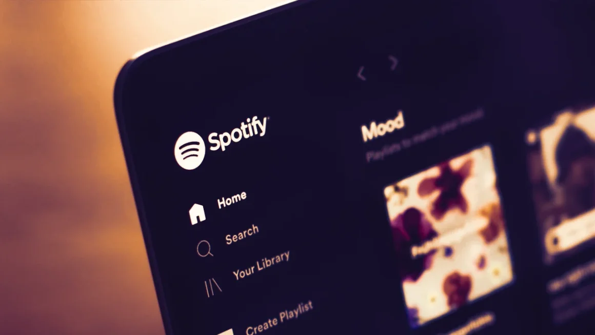 Spotify app interface showing home, search, and library options with mood playlists